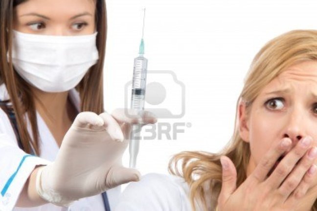 13585774-doctor-hand-with-syringe-needle-and-woman-fear-or-scared-of-injections-against-white-background-phob